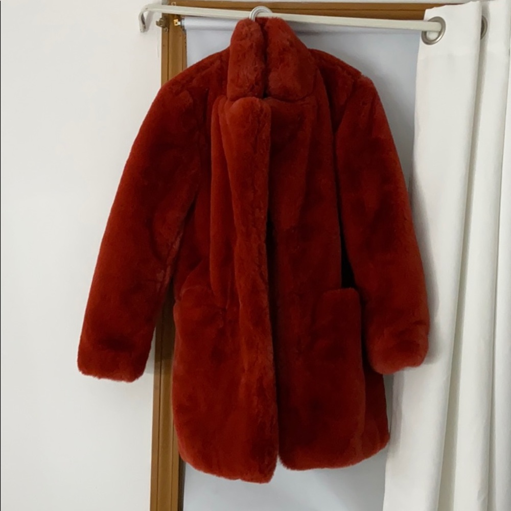 red furry faux fur coat